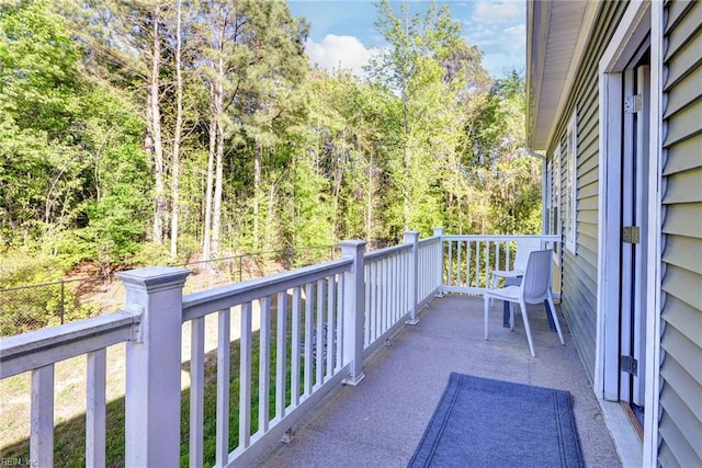 1208 Kings Land Ct, Williamsburg, VA 23185 - balcony featuring a forest view