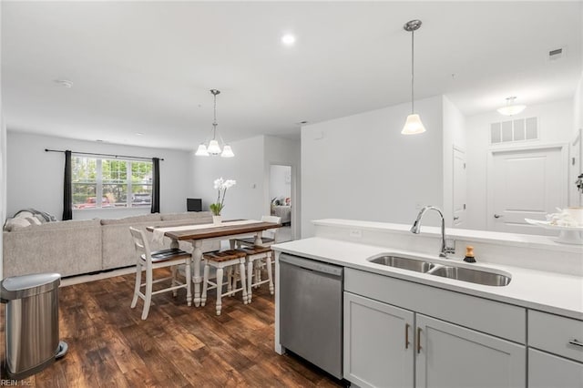 kitchen with dark wood-style floors, a sink, open floor plan, visible vents, and dishwasher