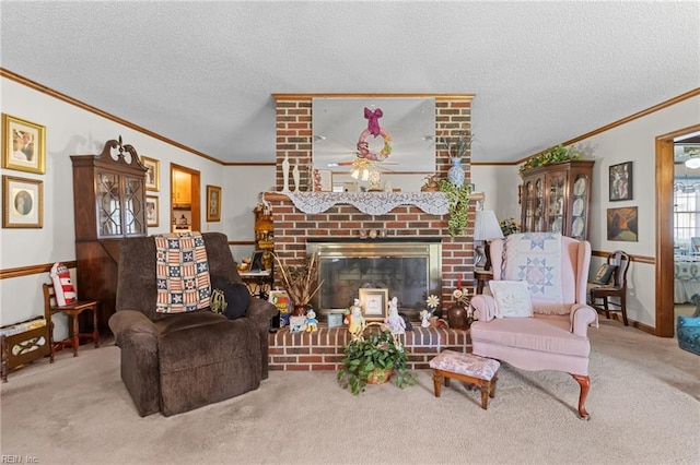 carpeted living room with ornamental molding, ceiling fan, a brick fireplace, and a textured ceiling