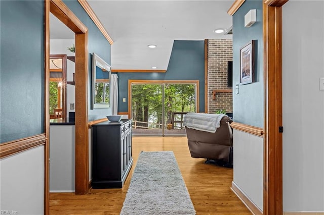 hallway with recessed lighting and wood finished floors