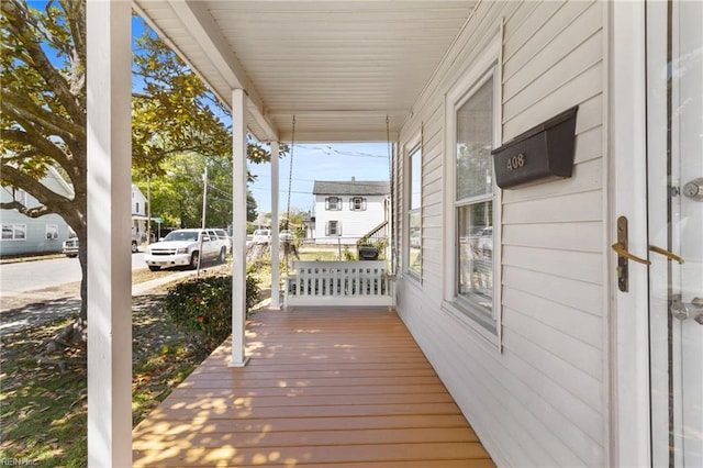 wooden deck with a porch
