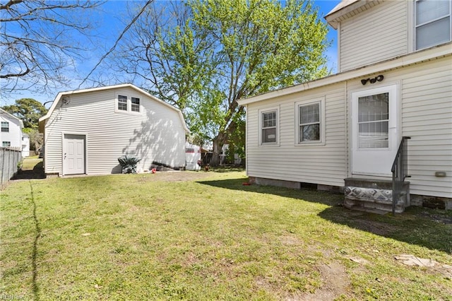 view of yard featuring entry steps and fence