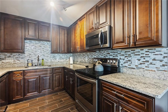 78 Kendall Dr, Newport News, VA 23601 - kitchen featuring light stone counters, a sink, stainless steel appliances, backsplash, and dark wood-style floors
