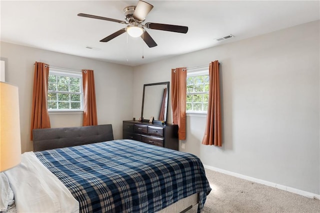 78 Kendall Dr, Newport News, VA 23601 - carpeted bedroom featuring baseboards, a ceiling fan, multiple windows, and visible vents