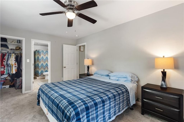 78 Kendall Dr, Newport News, VA 23601 - carpeted bedroom with a walk in closet, ensuite bath, a closet, baseboards, and ceiling fan
