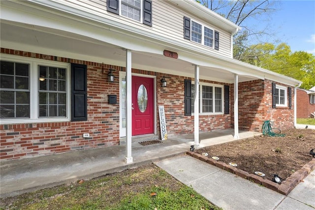 78 Kendall Dr, Newport News, VA 23601 - doorway to property featuring a porch and brick siding