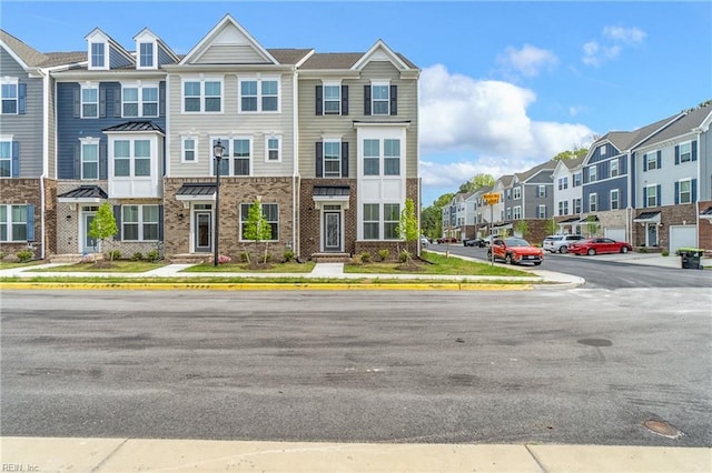 multi unit property featuring a residential view