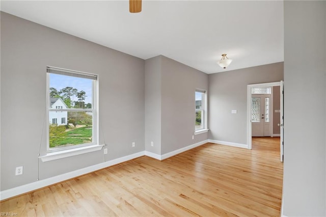 89 Sandy Bay Dr, Poquoson, VA 23662 - unfurnished room featuring plenty of natural light, light wood finished floors, and baseboards