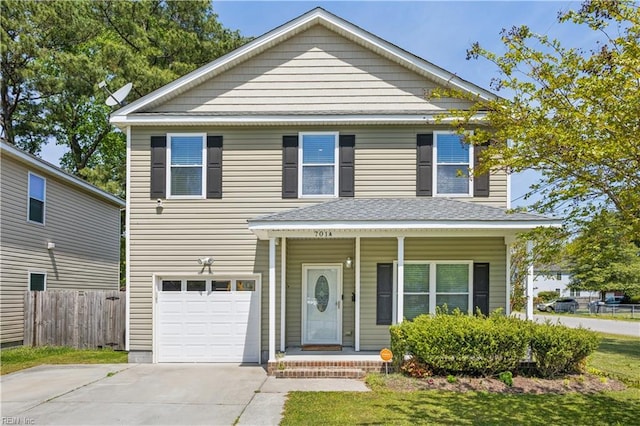 view of front of house with concrete driveway, fence, a porch, and a garage