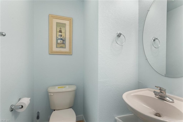 206 E Palmetto St, Kill Devil Hills, NC 27948 - bathroom with a sink and toilet