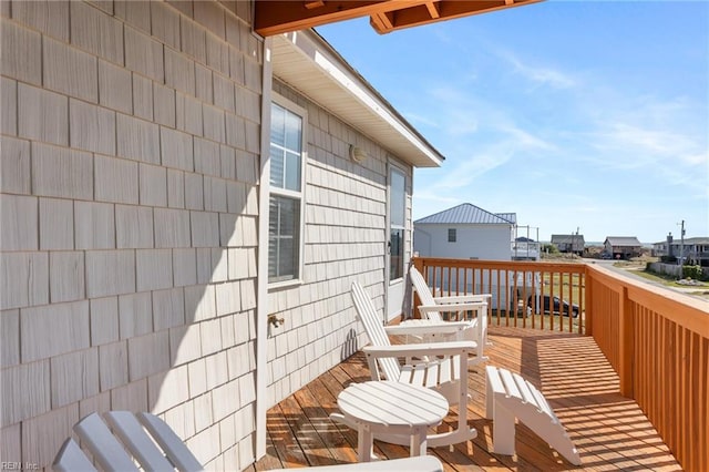 206 E Palmetto St, Kill Devil Hills, NC 27948 - view of wooden balcony featuring a deck