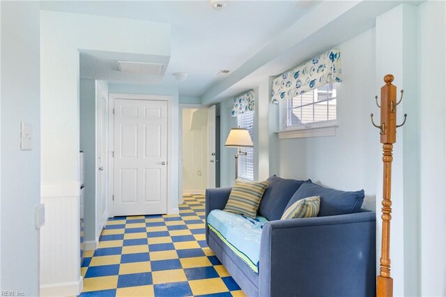 206 E Palmetto St, Kill Devil Hills, NC 27948 - interior space with tile patterned floors and baseboards