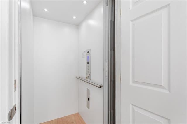 206 E Palmetto St, Kill Devil Hills, NC 27948 - room details with wood finished floors, recessed lighting, and elevator