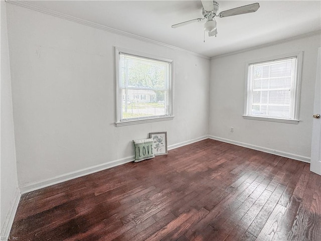 unfurnished room with wood-type flooring, baseboards, crown molding, and ceiling fan