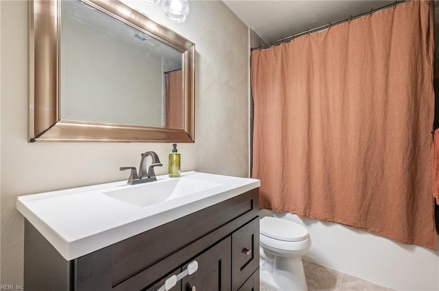 full bath with tile patterned floors, vanity, shower / bathtub combination with curtain, and toilet