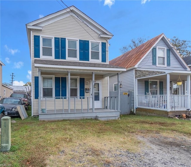 1405 Perry St, Chesapeake, VA 23324 - view of front facade with a front yard and covered porch