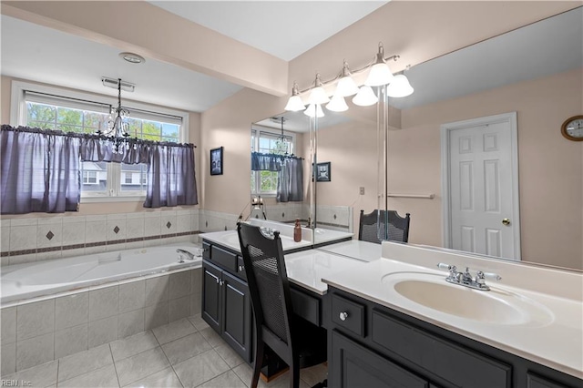 full bathroom featuring tile patterned flooring, visible vents, vanity, a bath, and a chandelier