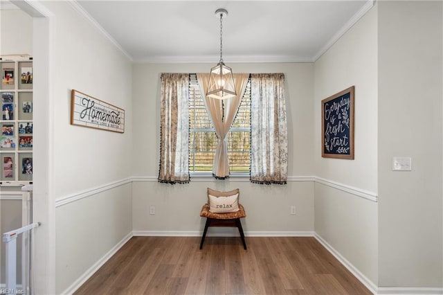 unfurnished room featuring baseboards, wood finished floors, and plenty of natural light