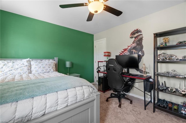 carpeted bedroom with baseboards and ceiling fan