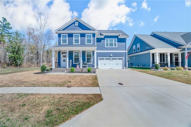 view of front of home with a porch, concrete driveway, a front lawn, and a garage