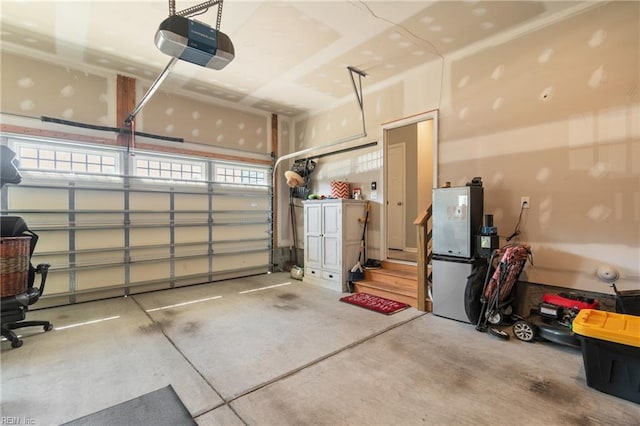 garage featuring a garage door opener