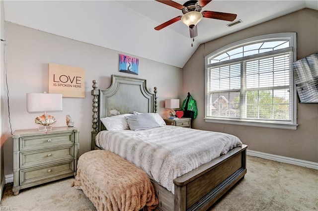 bedroom with vaulted ceiling, visible vents, baseboards, ceiling fan, and carpet floors