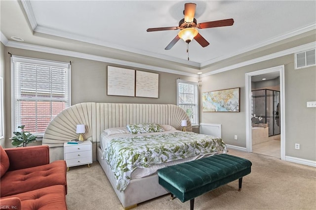 bedroom with light carpet, a tray ceiling, baseboards, ornamental molding, and visible vents