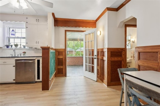24 Holly Dr, Newport News, VA 23601 - kitchen with white cabinets, stainless steel dishwasher, a ceiling fan, and a sink
