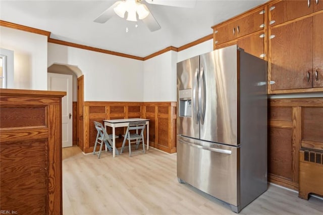24 Holly Dr, Newport News, VA 23601 - kitchen with a ceiling fan, ornamental molding, wainscoting, stainless steel fridge, and light wood-style flooring