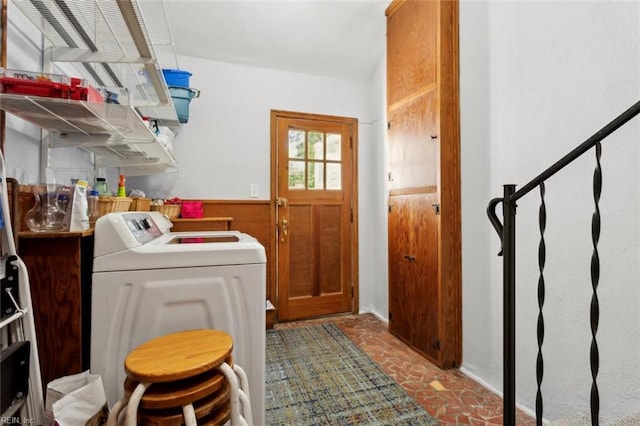 24 Holly Dr, Newport News, VA 23601 - clothes washing area with wainscoting, washer and clothes dryer, and laundry area
