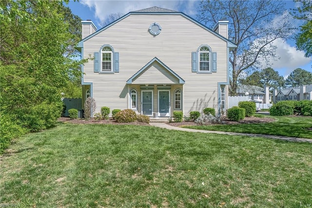5201 Bardith Cir, Virginia Beach, VA 23455 - view of front facade featuring a chimney and a front yard