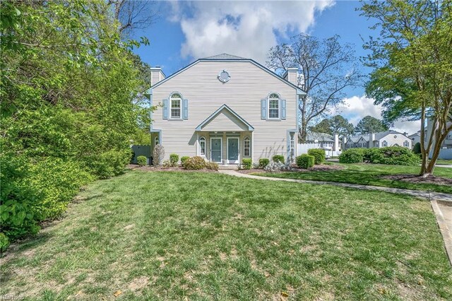 5201 Bardith Cir, Virginia Beach, VA 23455 - traditional home featuring a chimney and a front lawn