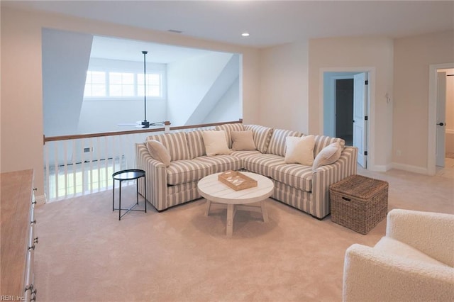 living room featuring ceiling fan, light carpet, and recessed lighting