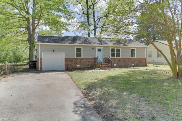 single story home featuring fence, a front yard, entry steps, and a garage