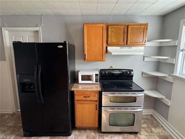 3800 Victoria Blvd, Hampton, VA 23669 - kitchen featuring range hood, open shelves, white microwave, double oven range, and black fridge with ice dispenser