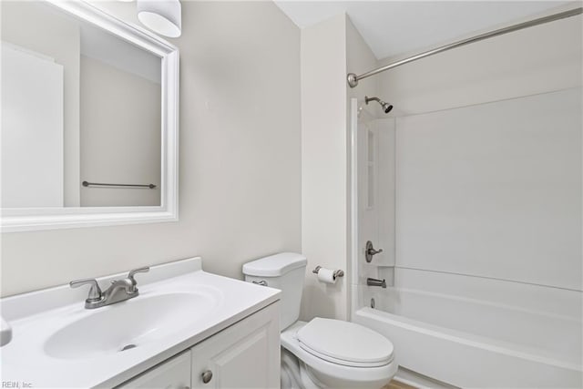 full bath with toilet, vanity, and bathing tub / shower combination