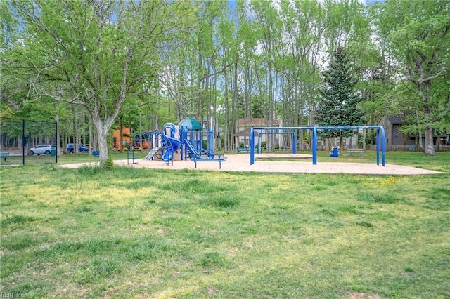 community jungle gym with a yard