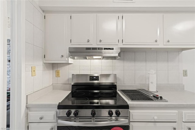 3300 Ocean Shore Ave Unit 503, Virginia Beach, VA 23451 - kitchen featuring light countertops, white cabinetry, stainless steel range with electric stovetop, and under cabinet range hood