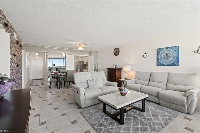 3300 Ocean Shore Ave Unit 503, Virginia Beach, VA 23451 - living area featuring a ceiling fan and a textured ceiling