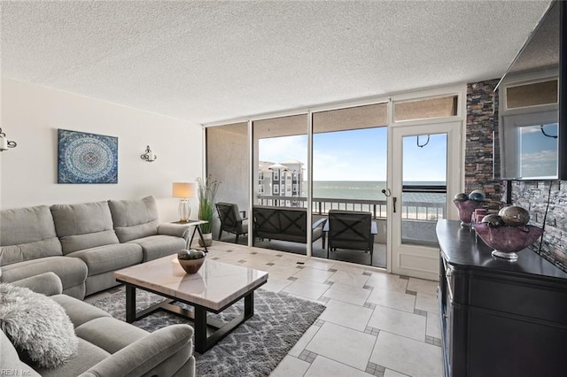 3300 Ocean Shore Ave Unit 503, Virginia Beach, VA 23451 - living room featuring a textured ceiling