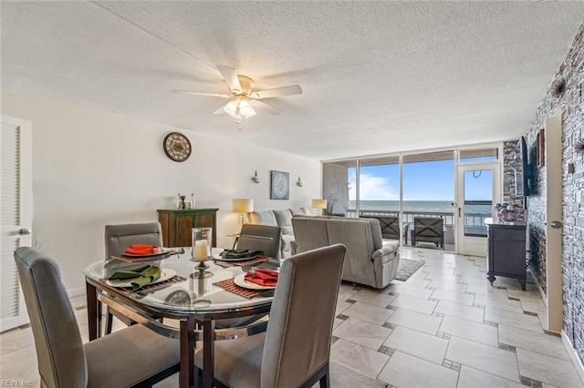 3300 Ocean Shore Ave Unit 503, Virginia Beach, VA 23451 - dining area with a textured ceiling and ceiling fan