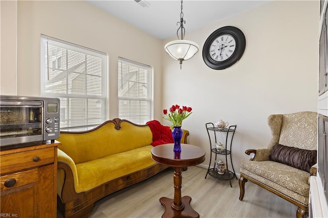 2064 Nicklaus Dr, Suffolk, VA 23435 - sitting room with a toaster and light wood-style floors