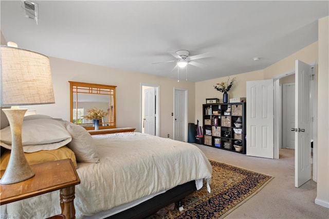 2064 Nicklaus Dr, Suffolk, VA 23435 - bedroom featuring visible vents, ceiling fan, and light colored carpet