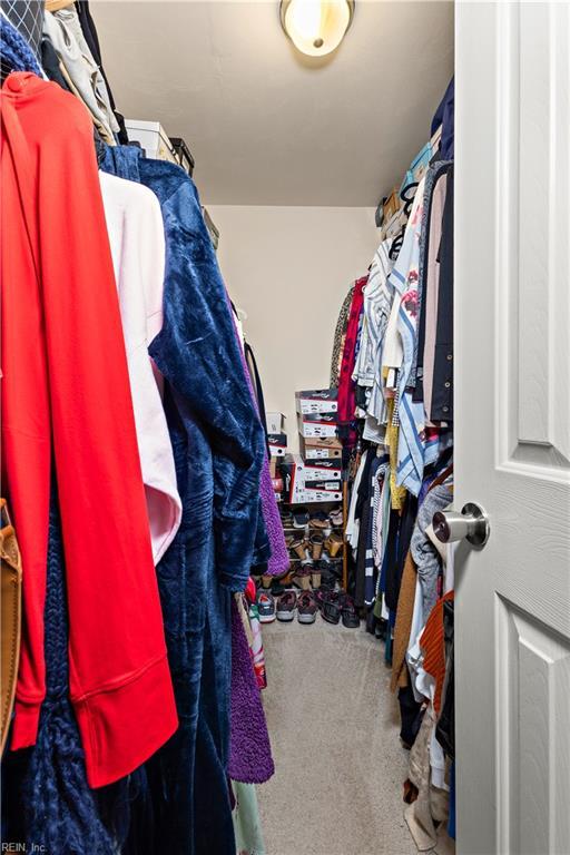 2064 Nicklaus Dr, Suffolk, VA 23435 - walk in closet with carpet floors