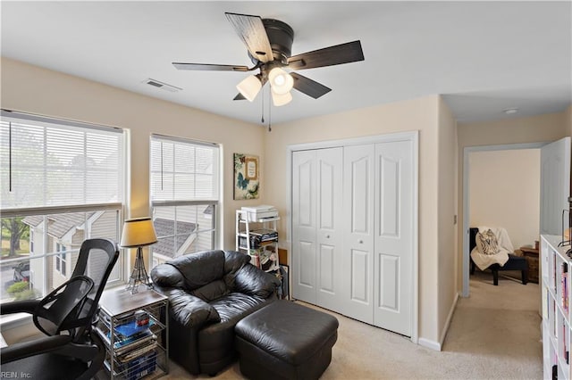 2064 Nicklaus Dr, Suffolk, VA 23435 - office area featuring light colored carpet, visible vents, plenty of natural light, and a ceiling fan