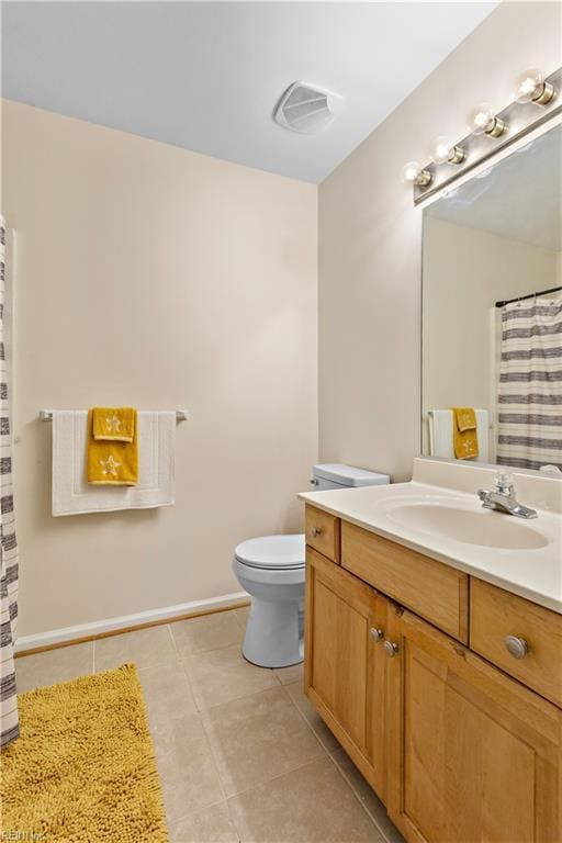 2064 Nicklaus Dr, Suffolk, VA 23435 - bathroom with visible vents, baseboards, toilet, vanity, and tile patterned flooring
