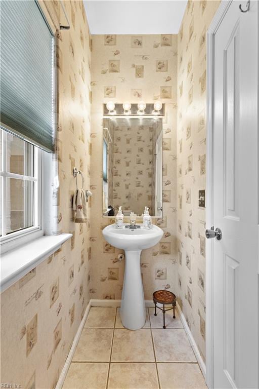 2064 Nicklaus Dr, Suffolk, VA 23435 - bathroom featuring tile patterned flooring, wallpapered walls, and baseboards