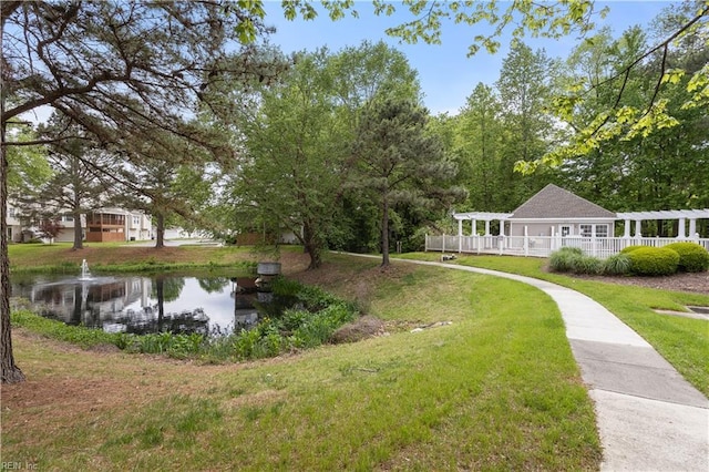 2064 Nicklaus Dr, Suffolk, VA 23435 - exterior space with fence, a yard, and a water view