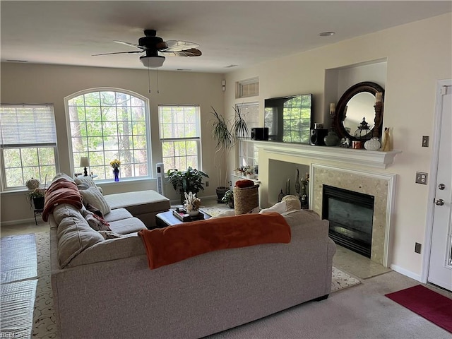 2064 Nicklaus Dr, Suffolk, VA 23435 - living room with ceiling fan, a premium fireplace, and baseboards