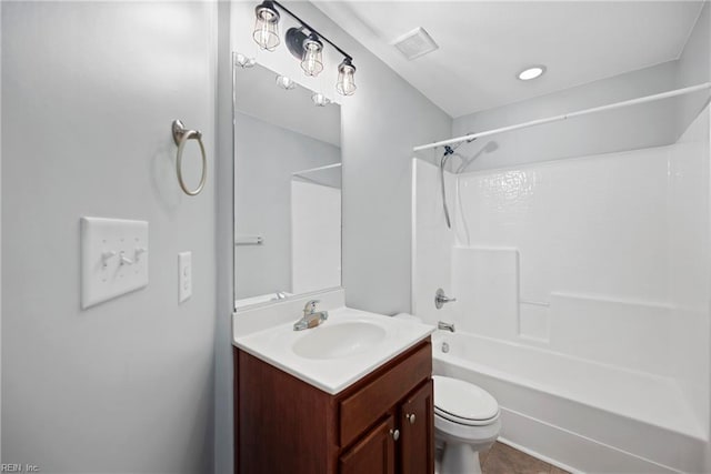 full bath featuring washtub / shower combination, visible vents, toilet, and vanity